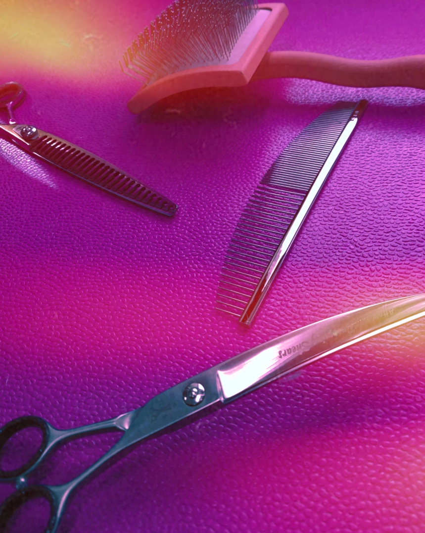 A pair of scissors and comb on top of purple cloth.